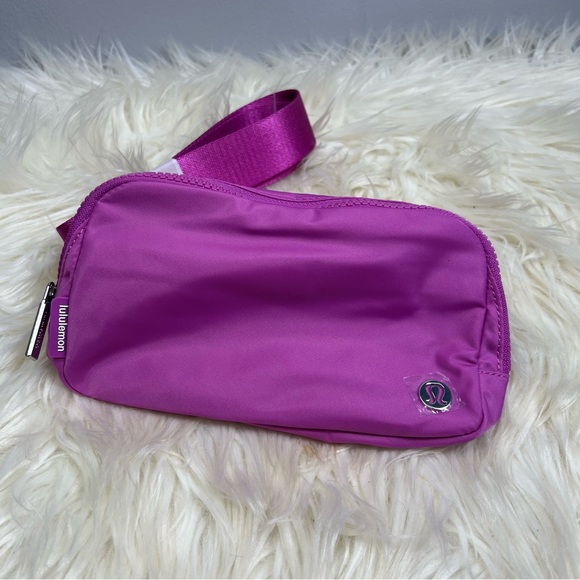 lululemon athletica Handbags - Everywhere belt bag Pow Pink Tone